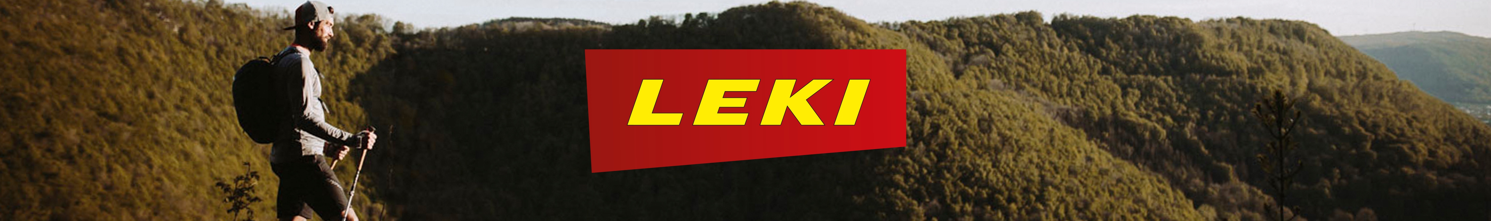 Leki header. A person on a hike using Leki walking poles