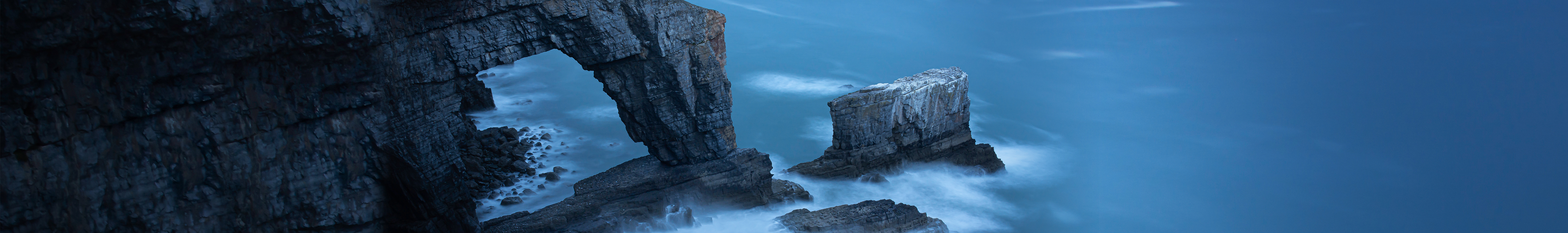 Big stones in the blue sea