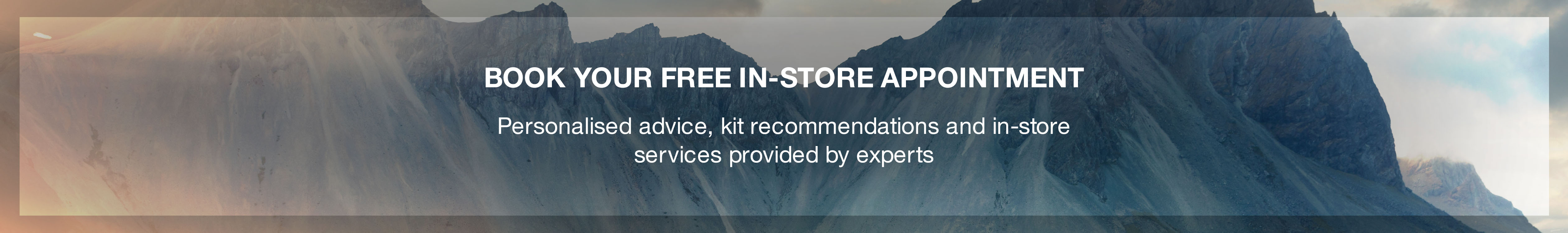 Book your free in-store appoinment message on a bluish mountain background image. 