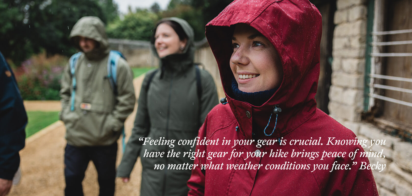 person wearing a waterproof jacket and walking with friends 