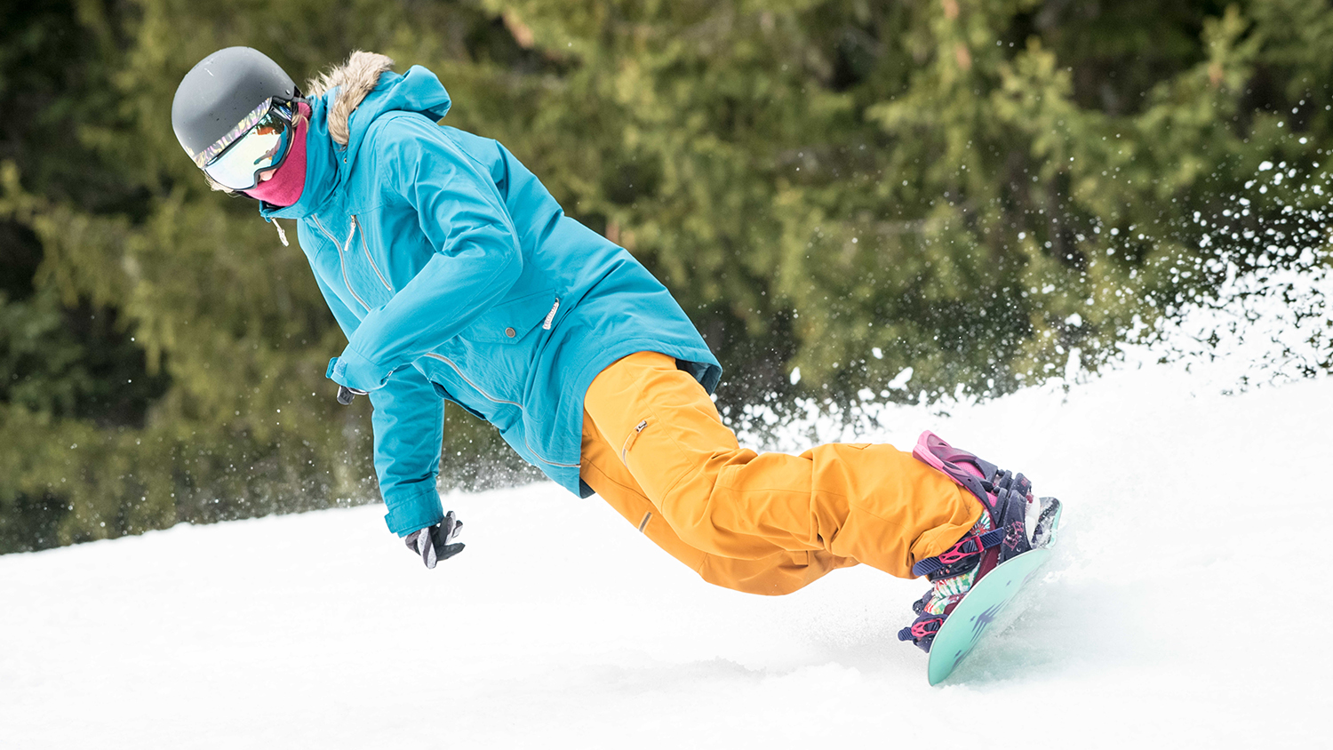 Woman snowboarding