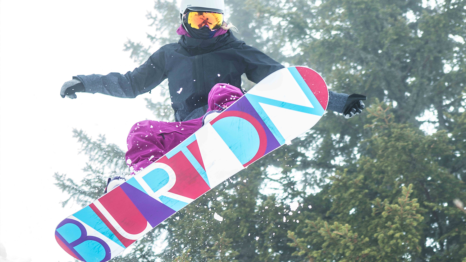 Woman snowboarding