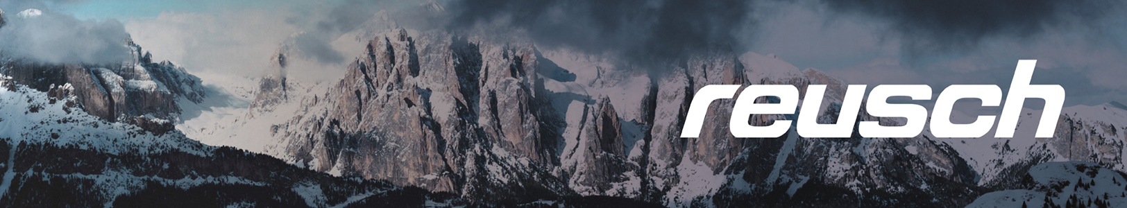 Reusch header. The Reusch logo over a mountain backdrop 