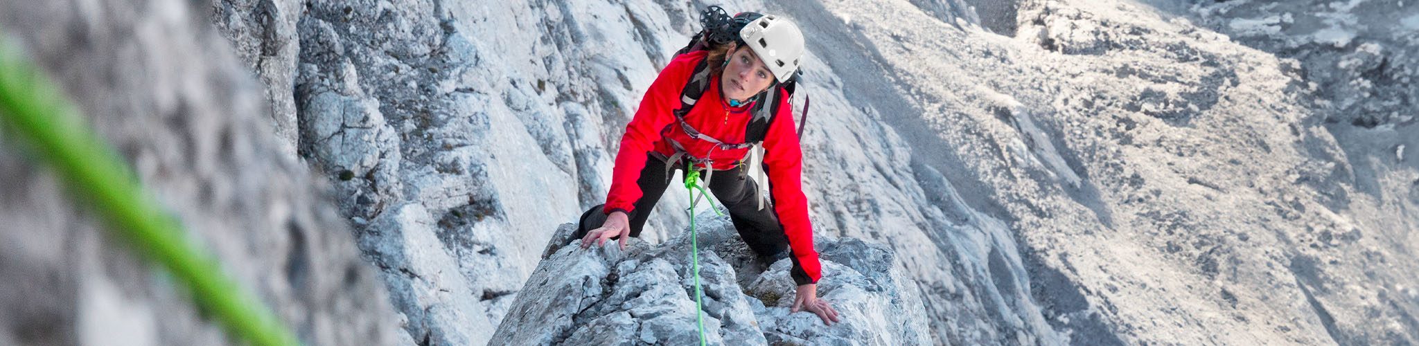 A woman alpine climbing