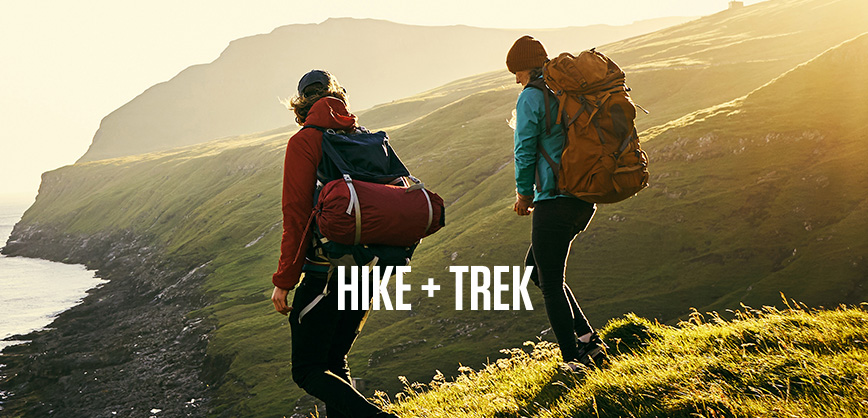 Shop Hike and trek. Two hikers walking on a clif path