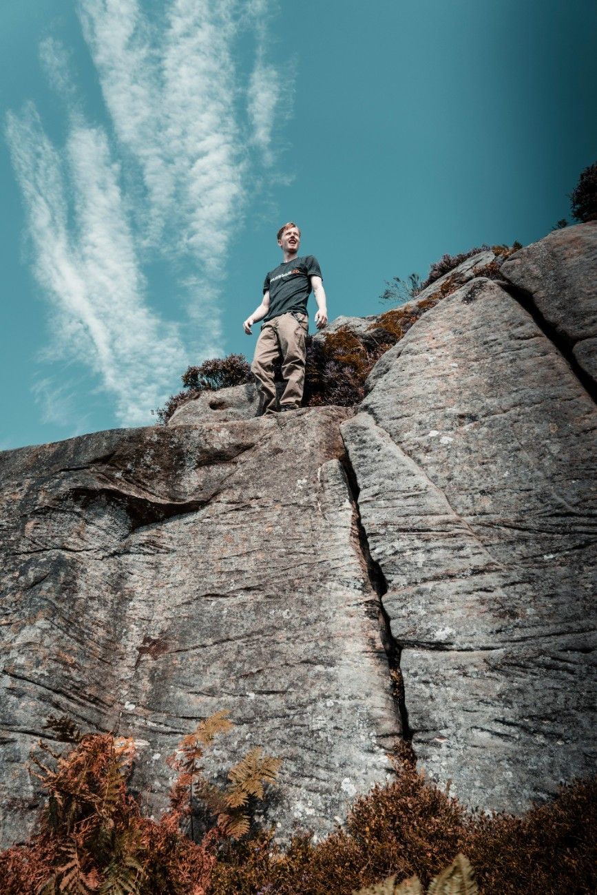 A person at the top of a climb