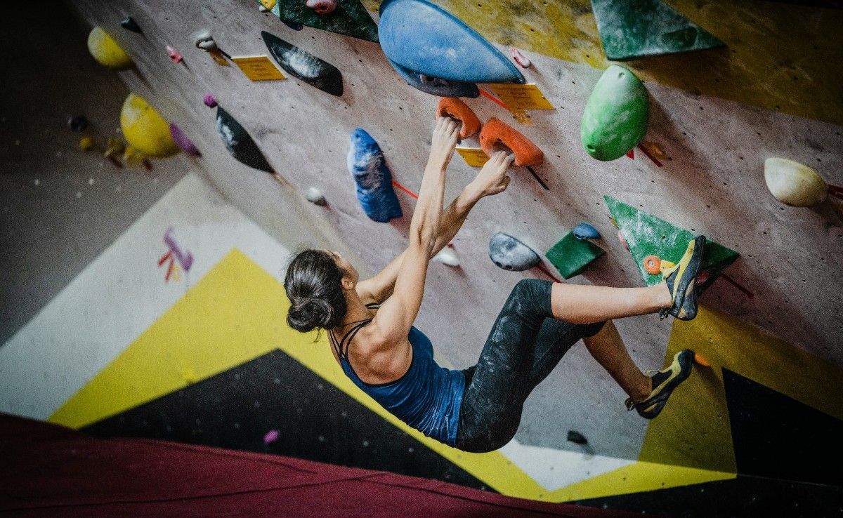 A person indoor climbing 