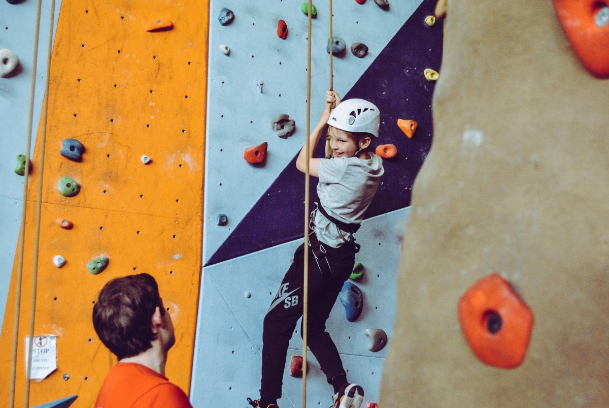 A child on a climbing wall 