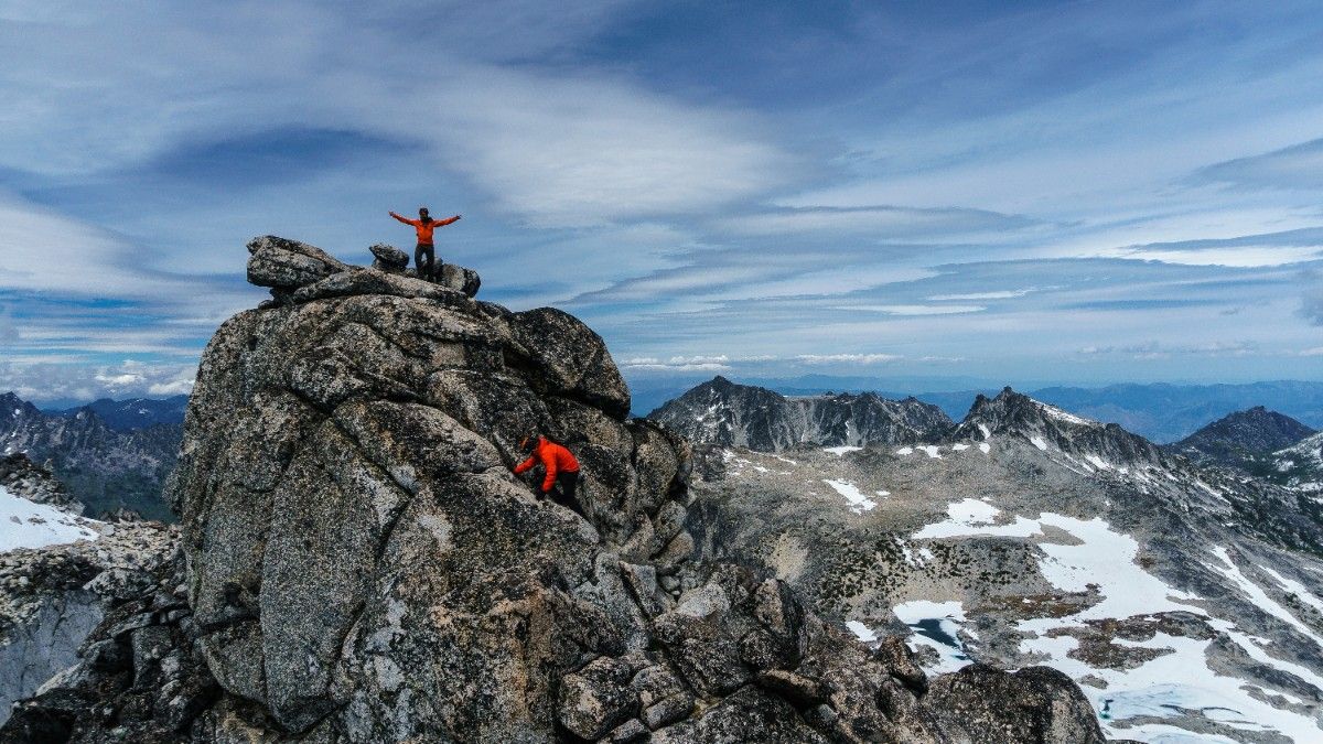 A person at the peak of a mountain 