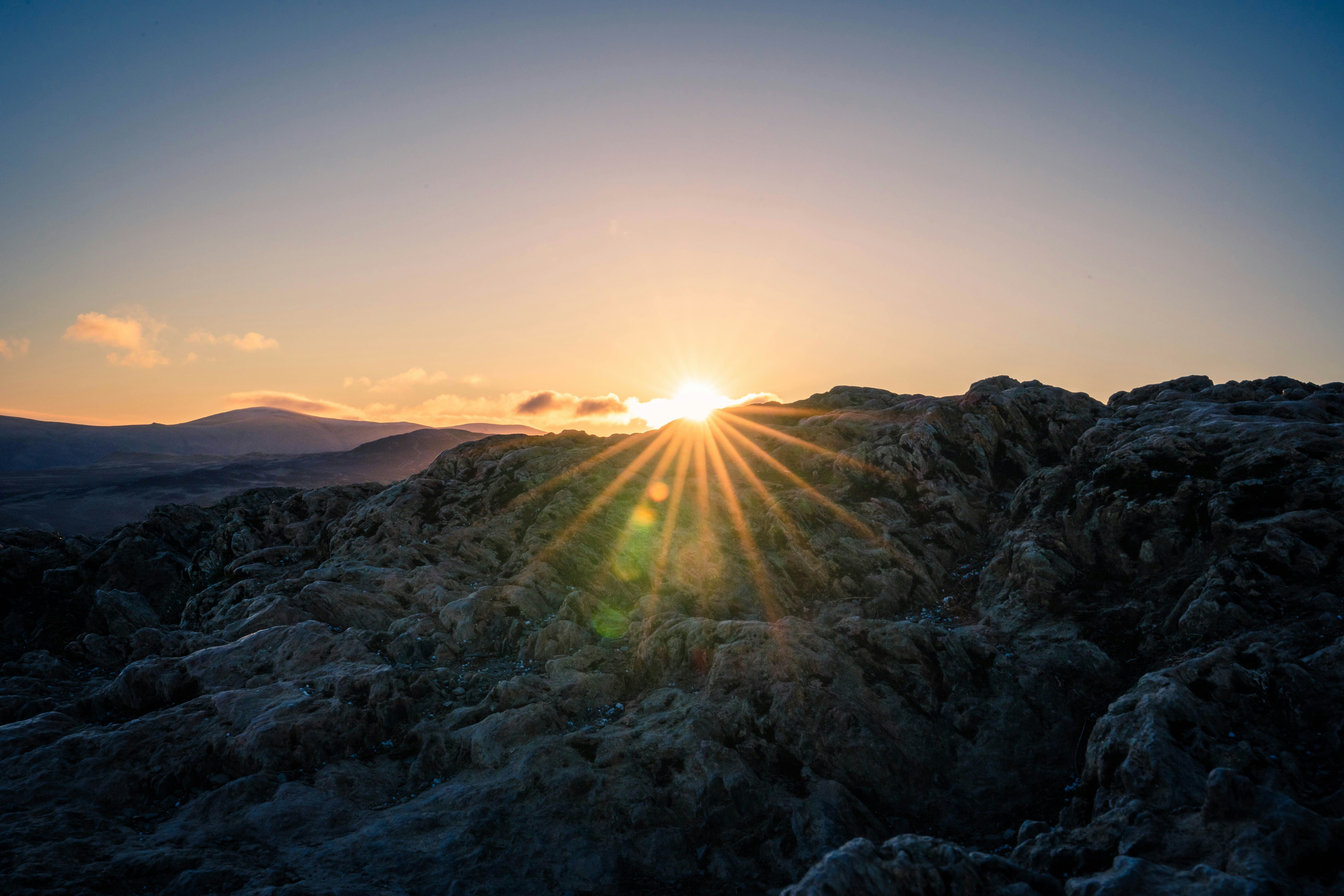 The sun rising over Catbells