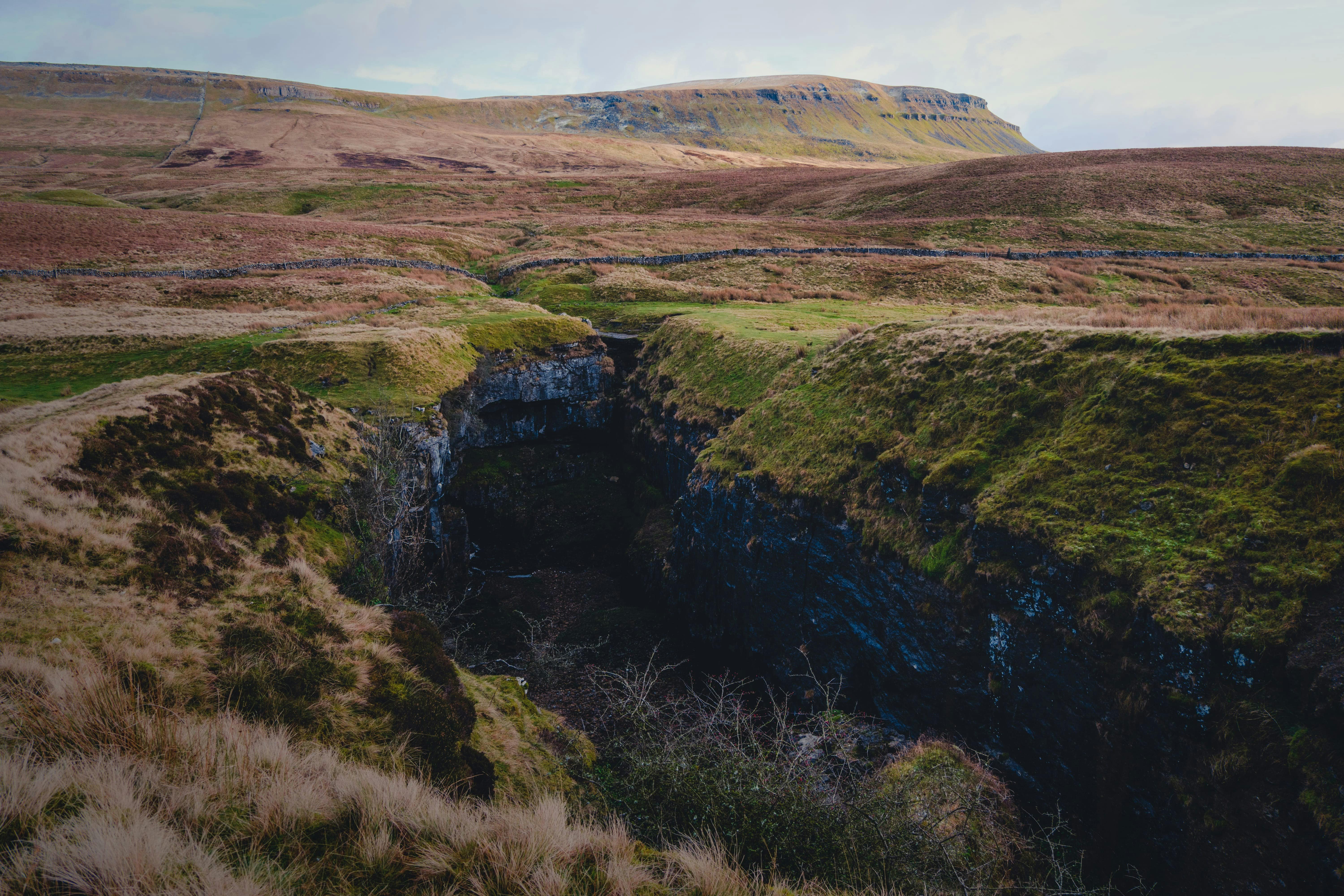 An image of a crater in the Yorkshire Moors with Pen Y Ghent in the background