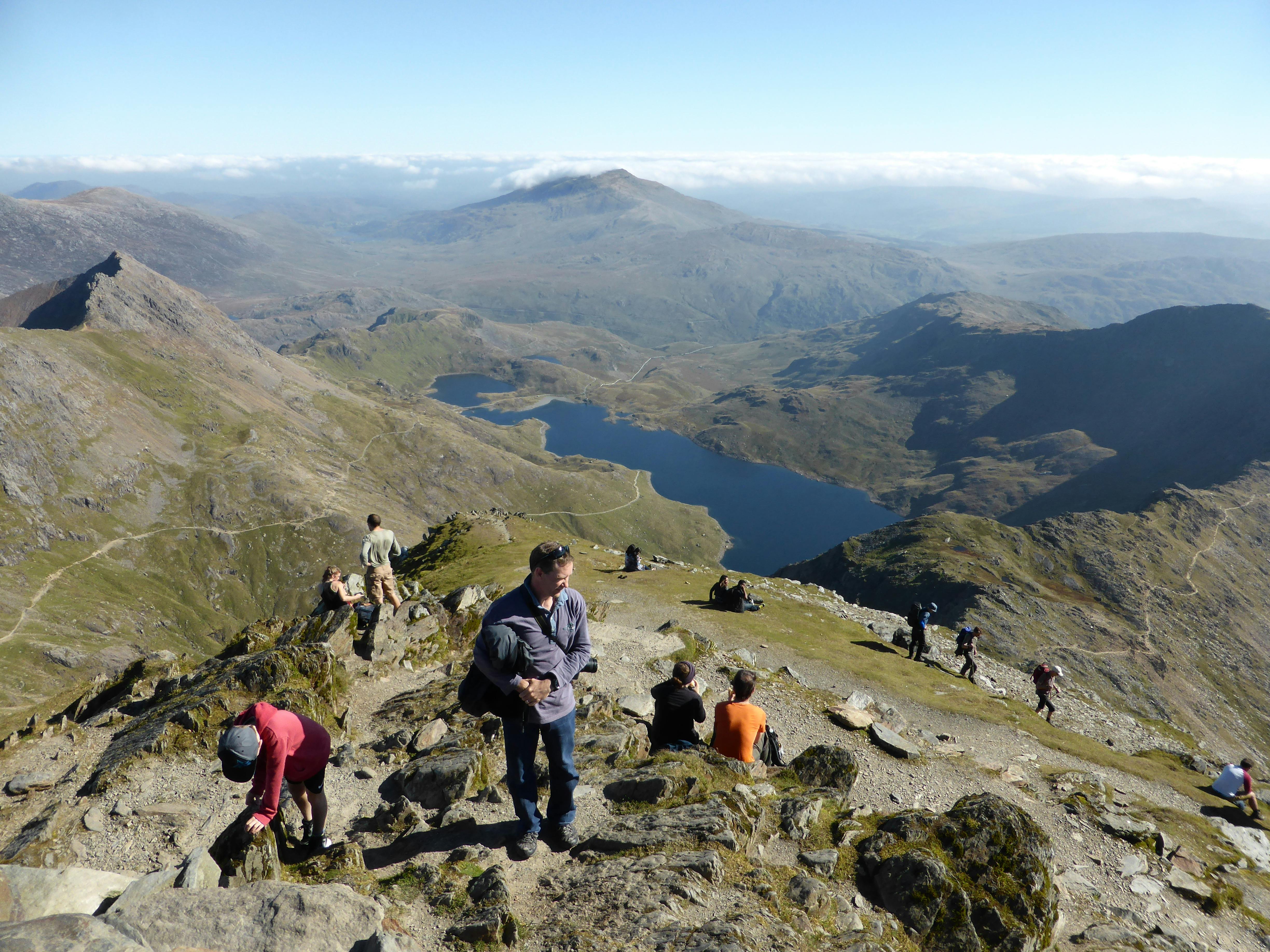 An image of a group of people at Snowdon's peak 