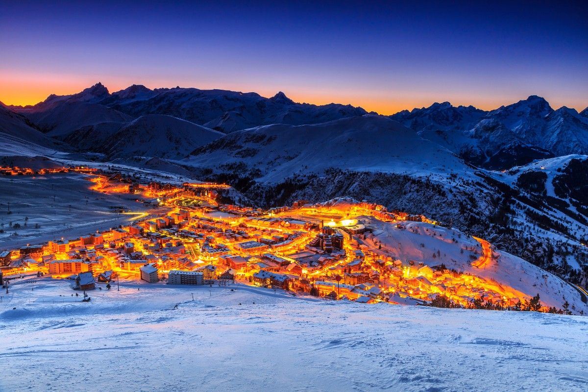 Alpe d'Heuz ski resort at night 