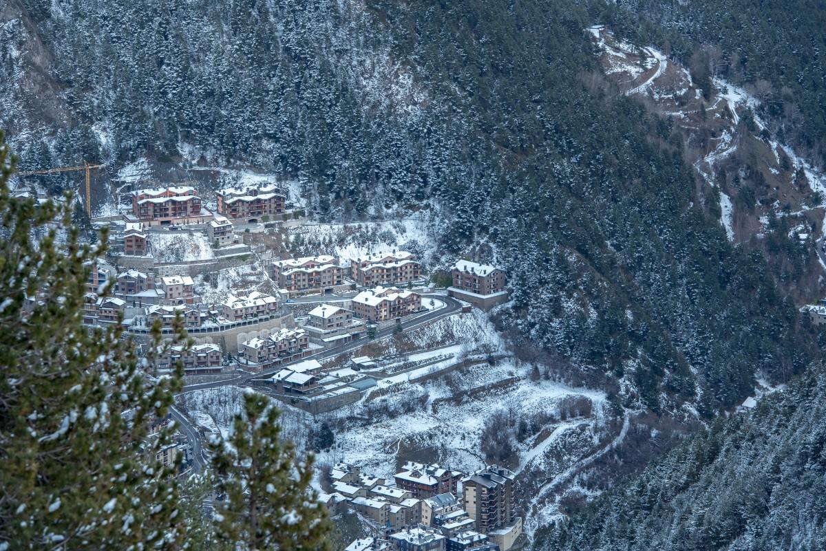 An aerial view of Arinsal ski resort in the snow 