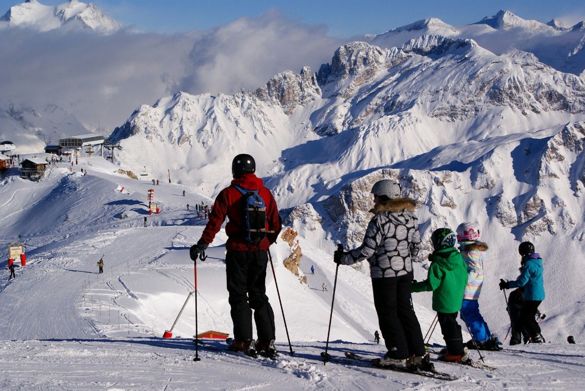 A family out skiing at Courchevel ski resort