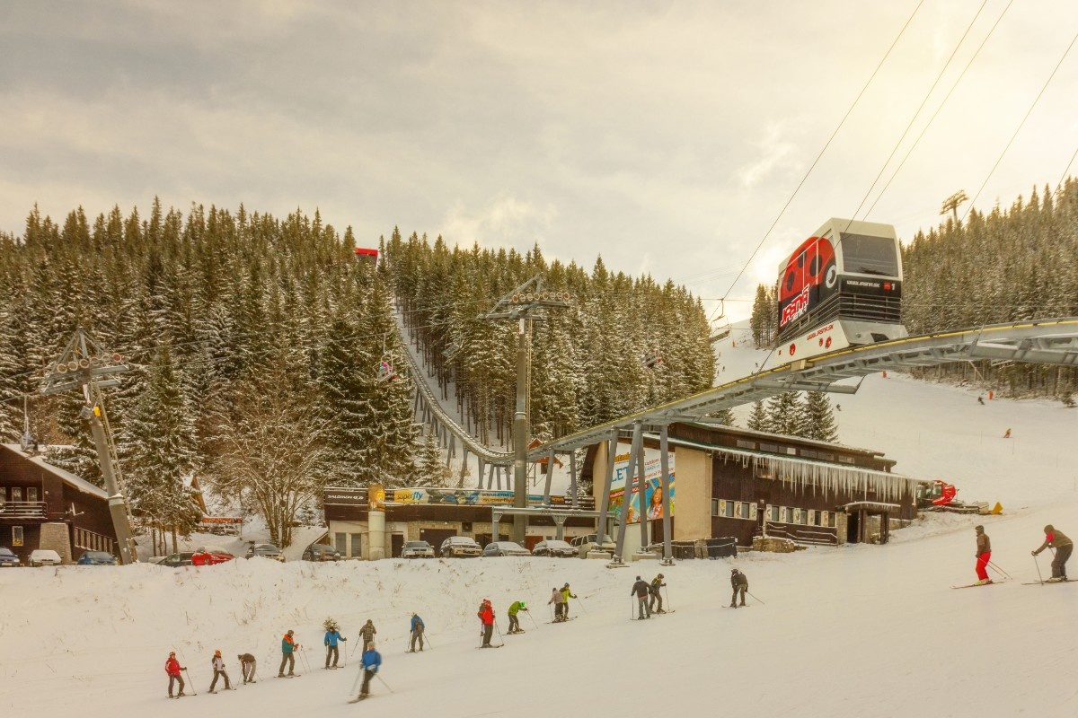 A monorail going up the mountain at Jasna Ski Resort