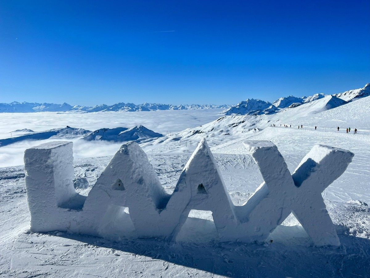 A sign reading Laax, at Laax Ski Resort