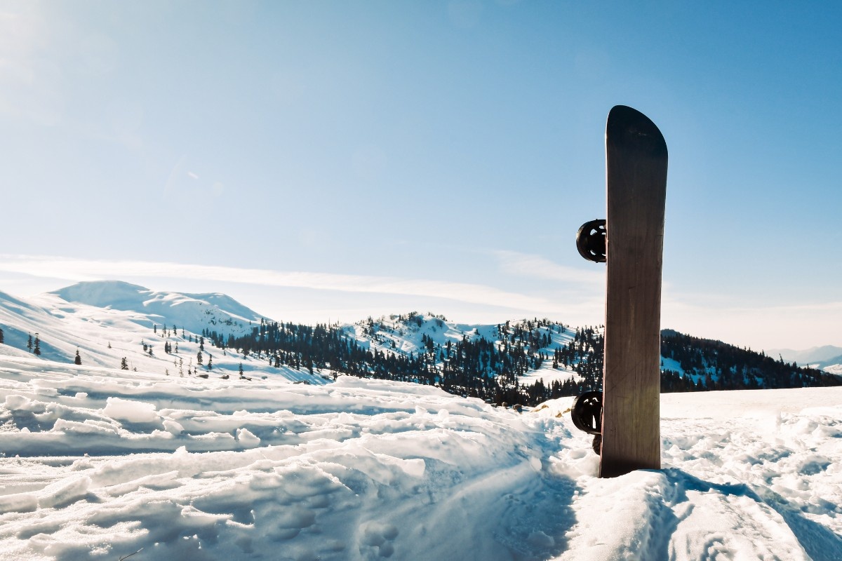 A snowboard in the snow at Laax Ski Resort