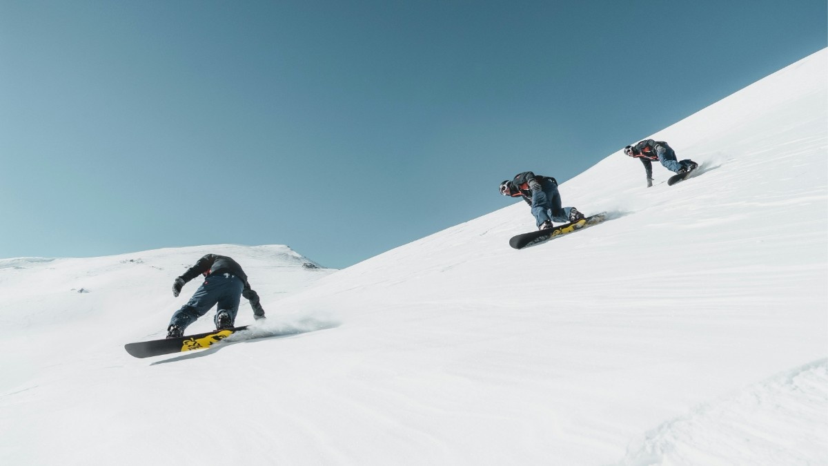 Snowboarders at Les Menuires ski resort