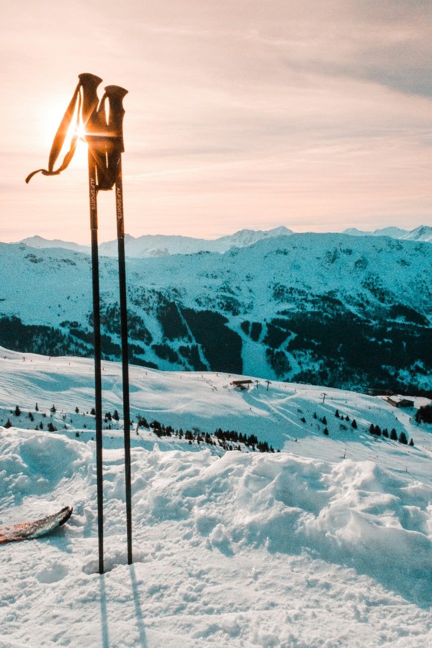 Ski poles in the snow at Méribel Ski Resort