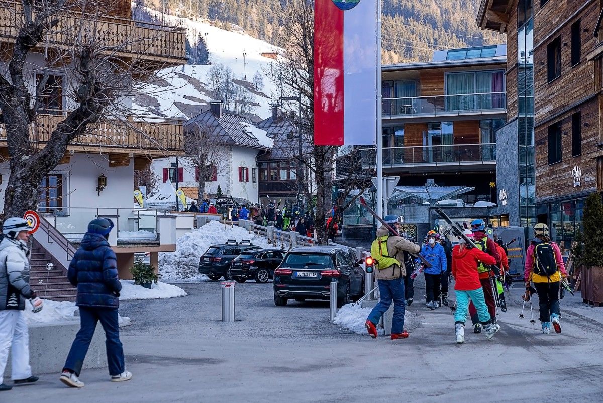 Skiers walking through the town centre in St Anton ski resort 