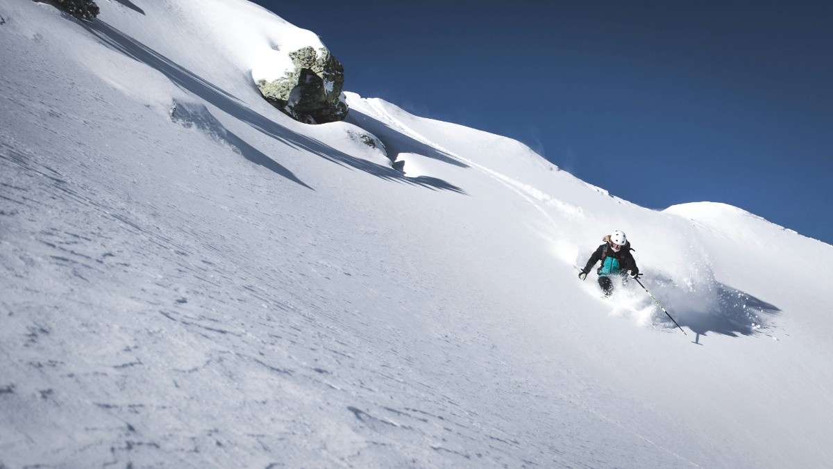 A skier in Verbier on the Swiss alps 